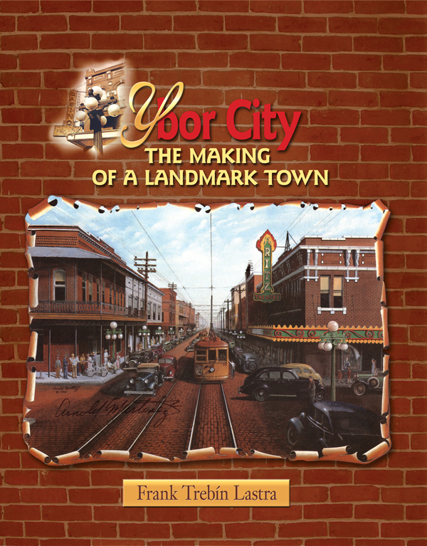 A picture of the cover of the book, Ybor CIty, displaying a city center with a train track.