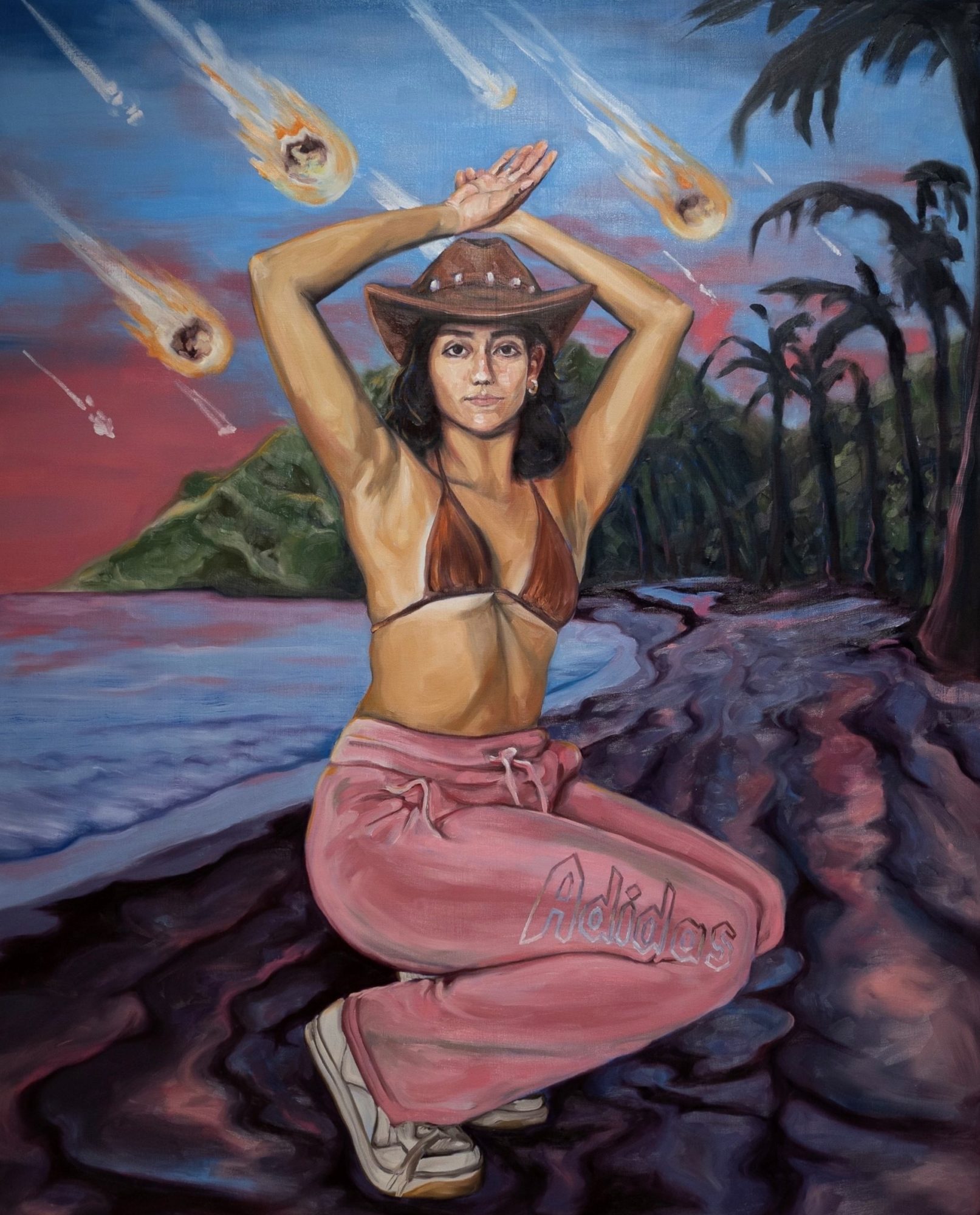 Image of a painting of a woman who poses on a beach; behind her a cluster of meteors barrel towards the tropical setting